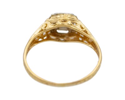 Lot 72 - An antique continental 18k gold with a diamond solitaire ring.