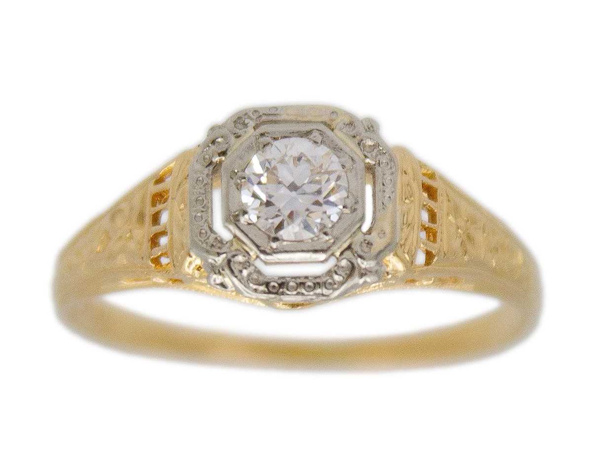 Lot 72 - An antique continental 18k gold with a diamond solitaire ring.