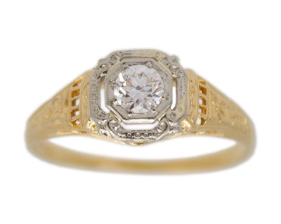 Lot 47 - An antique continental 18k gold with a diamond solitaire ring.