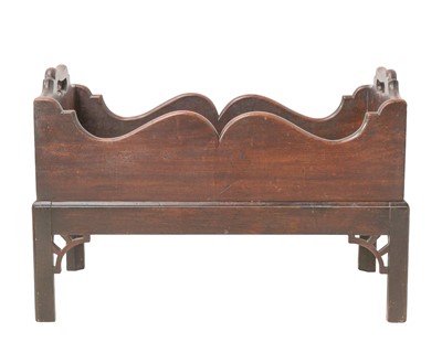 Lot 948 - A mahogany rectangular jardiniere on a stand.
