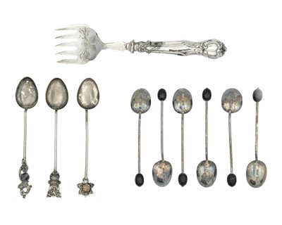 Lot 170 - A set of six silver coffee bean spoons, a set of three gem set spoons, and a silver handled fork.