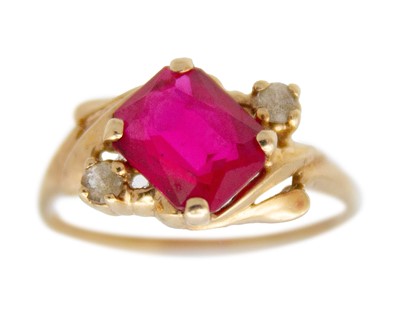 Lot 58 - A 10k gold and synthetic ruby ring.