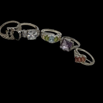 Lot 140 - Five 925 stamped fashion rings of various sizes.