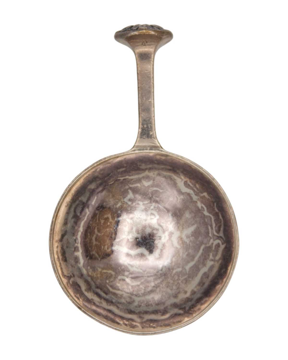 Lot 9 - A E JONES - An Arts & Crafts silver caddy spoon.