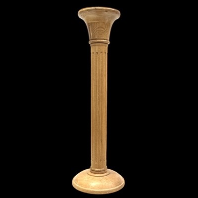 Lot 167 - A modern blond oak torchere signed John...