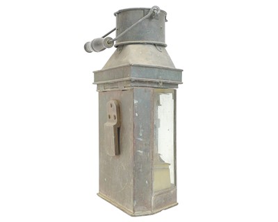 Lot 63 - A copper bulkhead lamp.