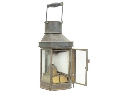 Lot 63 - A copper bulkhead lamp.