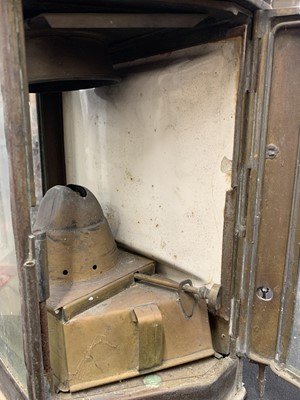 Lot 63 - A copper bulkhead lamp.