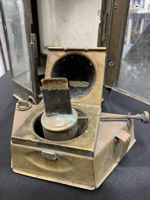 Lot 63 - A copper bulkhead lamp.