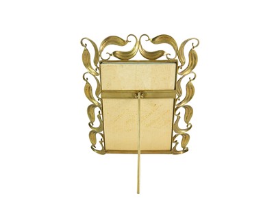 Lot 73 - An ornate Art Nouveau brass frame.