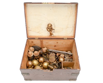 Lot 987 - A stained pine campaign style chest with architectural fittings.