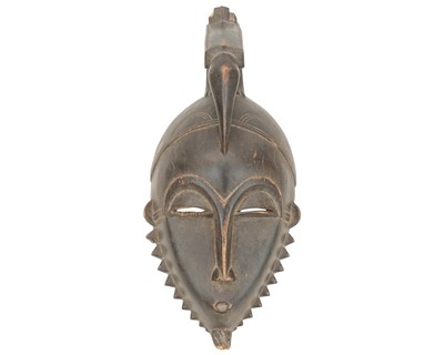 Lot 10 - An African Baule ancestor mask.