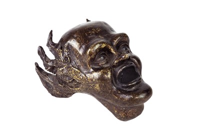Lot 147 - A cast bronze mask desk weight.