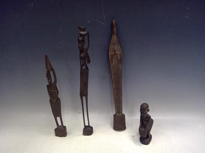 Lot 176 - Four Carved African Figures. The Figure...