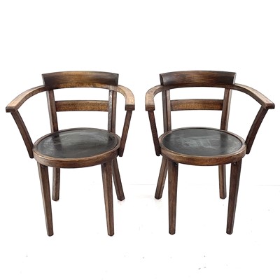 Lot 913 - A pair of continental beech cafe elbow chairs.