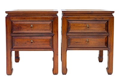 Lot 953 - A pair of Chinese hardwood bedside chests.