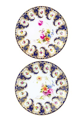 Lot 592 - A pair of Royal Worcester cabinet plates, painted by Ernest Phillips.