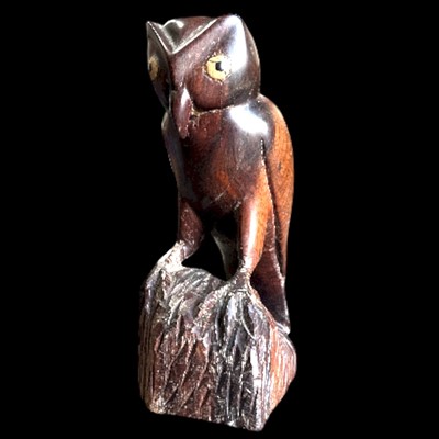 Lot 199 - A hand-carved ironwood owl, 21cm tall.