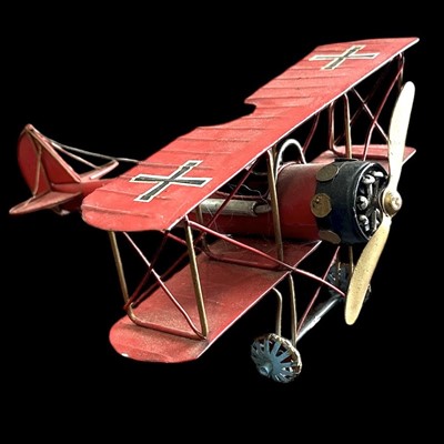 Lot 197 - A tinplate model of a WWI German biplane, 30cm...