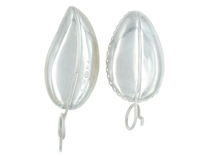 Lot 5 - Two George III silver leaf-shaped tea caddy spoons.