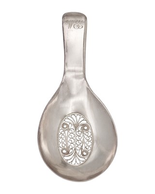 Lot 53 - A small Georgian silver caddy spoon with filigree decoration by Samuel Pemberton.
