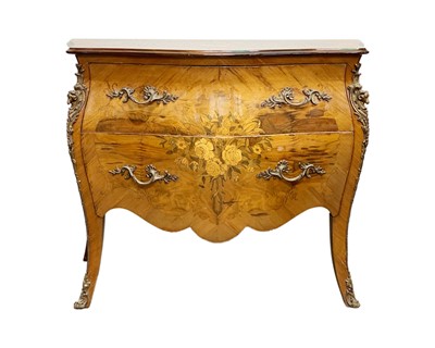 Lot 915 - A Continental marquetry bombe chest.