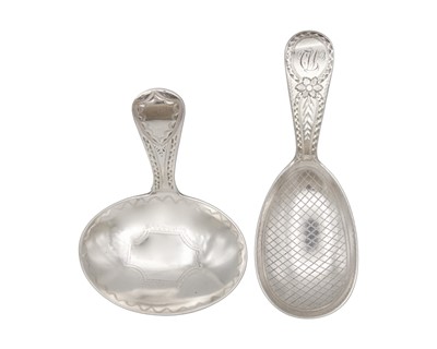 Lot 64 - Two George III silver bright cut caddy spoons by John Lias.