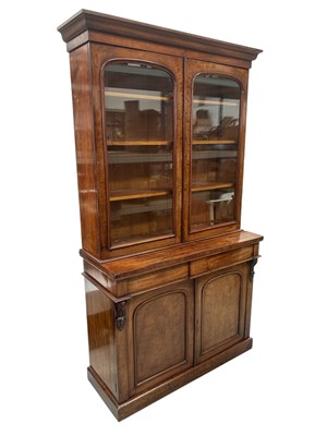 Lot 9 - A Victorian bookcase cabinet. In Mahogany, the...