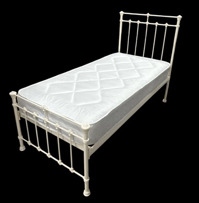 Lot 20 - A Metal Single Bed and Mattress. The Bed is...