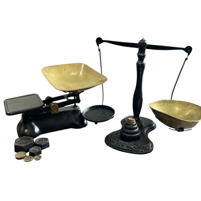 Lot 104 - Two sets of scales, the beam scales are by...