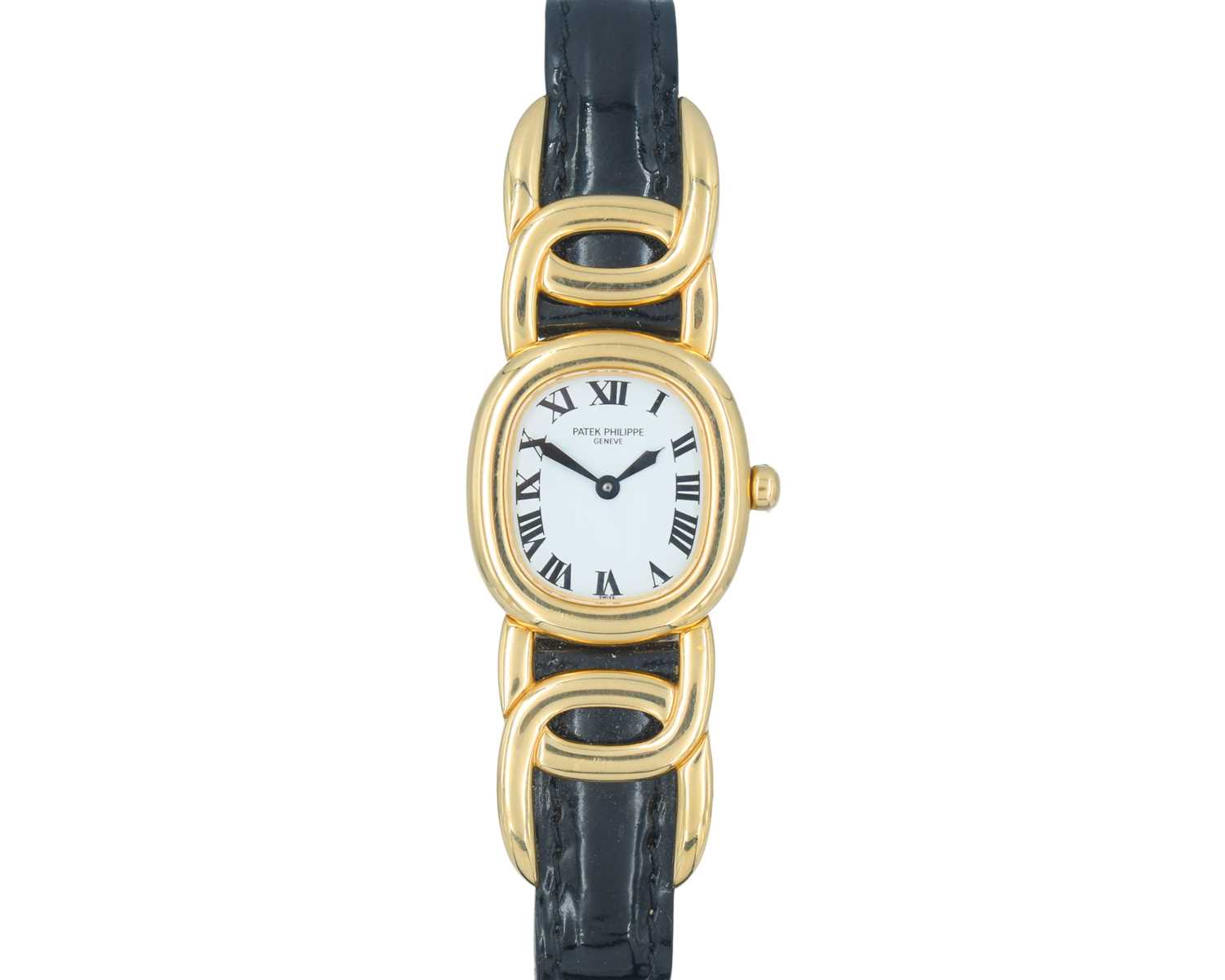 Lot PATEK PHILIPPE - An 18k Golden Ellipse ladies quartz wristwatch.