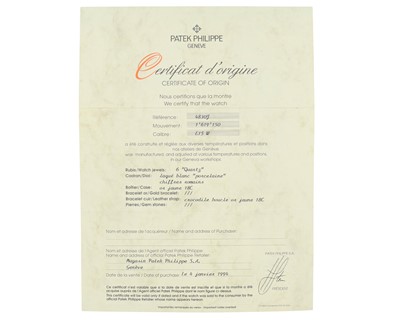 Lot PATEK PHILIPPE - An 18k Golden Ellipse ladies quartz wristwatch.