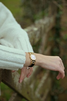 Lot 1050 - PATEK PHILIPPE - An 18k Golden Ellipse ladies quartz wristwatch.