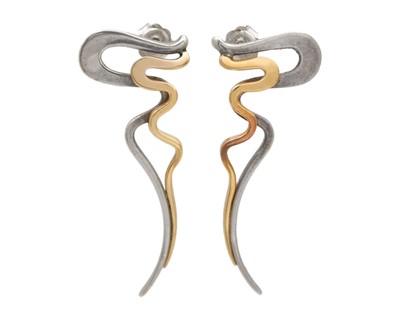 Lot 85 - A pair of gold and silver earrings.