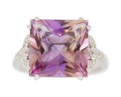Lot 91 - A 14k white gold ametrine and diamond dress ring.