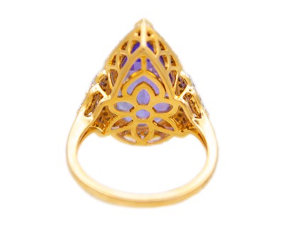 Lot LORIQUE 18k gold tanzanite and diamond dress ring.