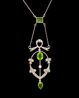 Lot 70 - An Art Nouveau style large silver, green paste, and pearl pendant necklace.
