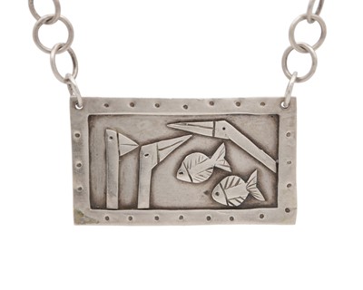 Lot 102 - A modern silver bird and fish pendant necklace.