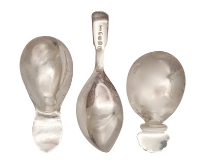 Lot 12 - A selection of three George III silver caddy spoons.