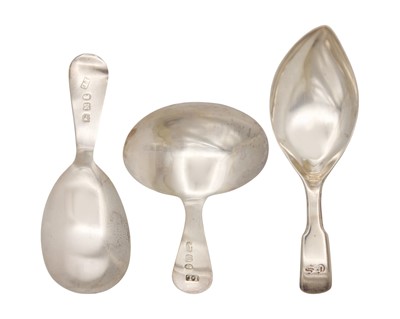 Lot 12 - A selection of three George III silver caddy spoons.