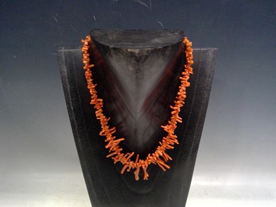 Lot 29 - A Red Coral Necklace. The Necklace is 50cm...