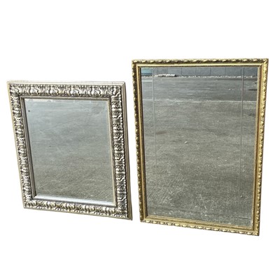 Lot 172 - An Ornate silver finish bevelled edge mirror,...