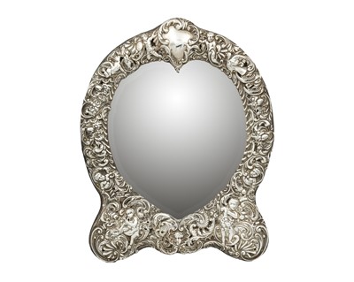 Lot 125 - A good Edwardian silver-mounted heart-shaped easel mirror by William Comyns.