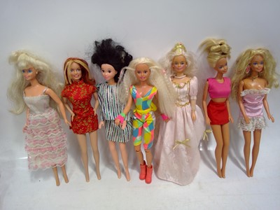 Lot 191 - Six Barbies and a Rock Climbing Sindy. The...