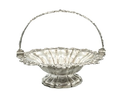 Lot 188 - A George IV silver swing handled pedestal basket by William Eley II.