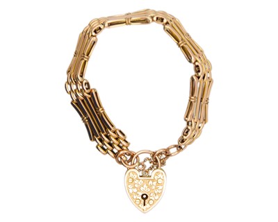 Lot 9 - A 9k rose gold gate bracelet.