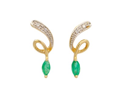 Lot 69 - A 14k gold, emerald, and diamond stud earrings.