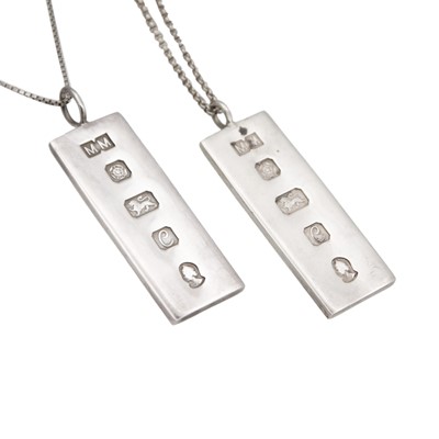 Lot 73 - Two silver ingot pendant necklaces.