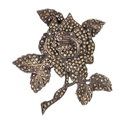 Lot 74 - A silver and marcasite set rose flower brooch.