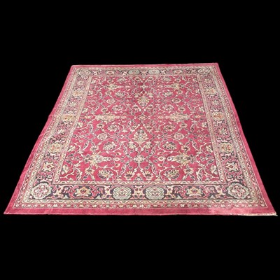 Lot 198 - A machine-made Wool rug. 210cm x 270cm. It has...